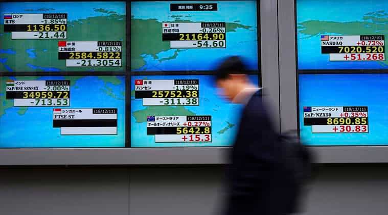 Asia shares edge higher, oil slips as Suez Canal ship re-floated