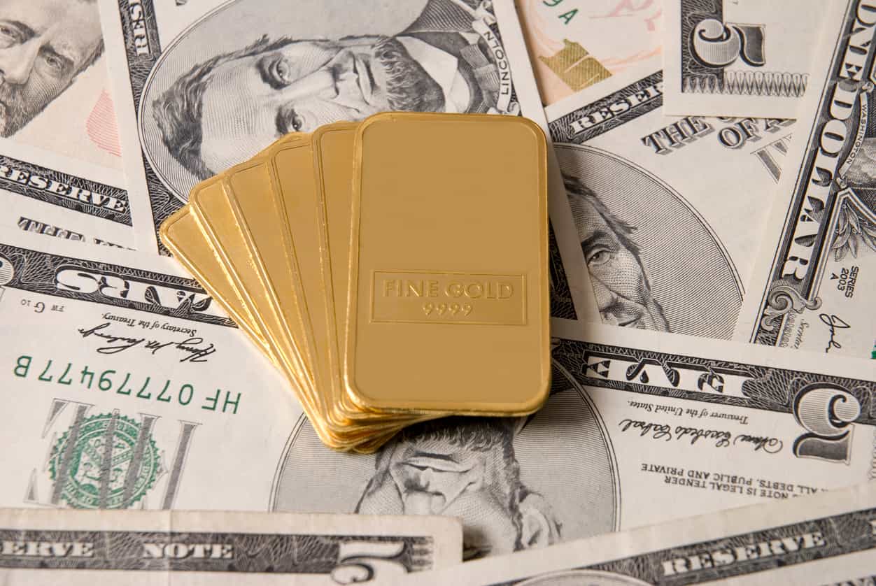 Gold heads for weekly fall as fewer Fed rate cut prospects weigh