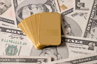 Gold heads for weekly fall as fewer Fed rate cut prospects weigh