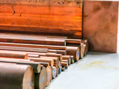 Rising LME stocks, mixed China data keep copper steady